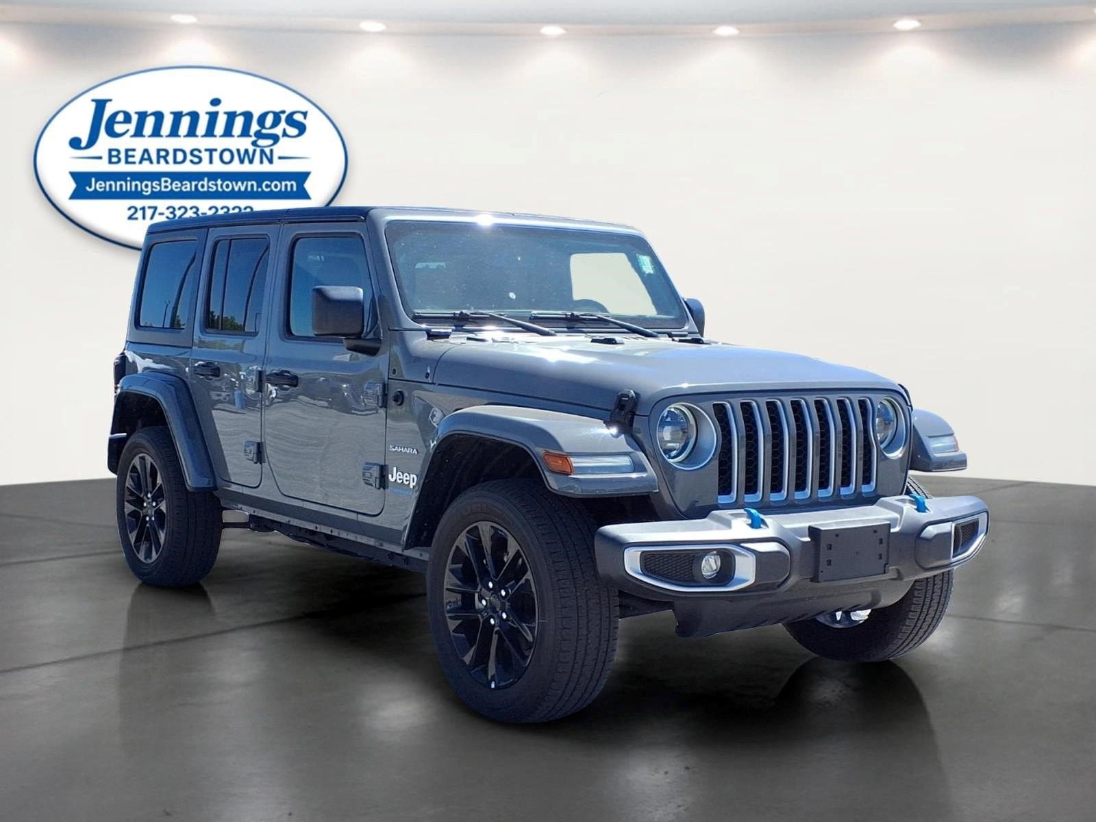 2023 Jeep Wrangler 4xe Sahara in Grey — front three-quarter view