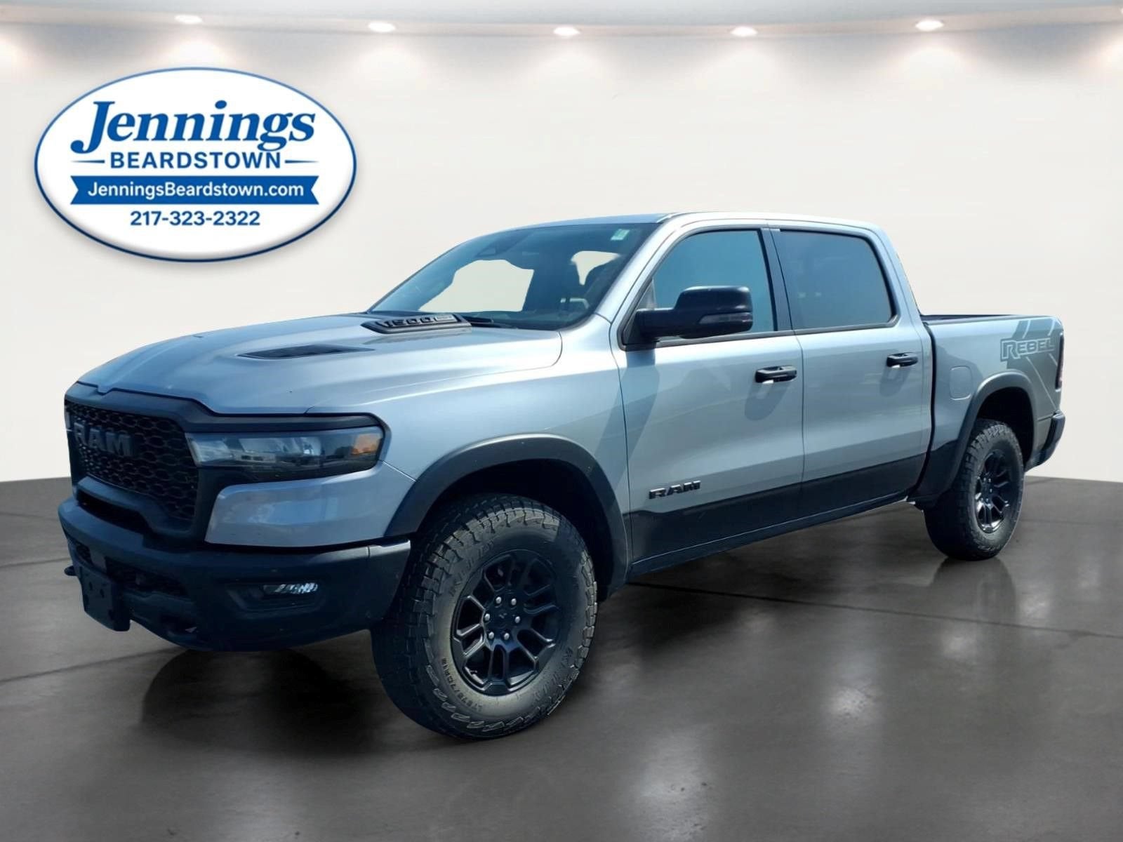2025 RAM 1500 Rebel in Billet Silver M — front three-quarter view