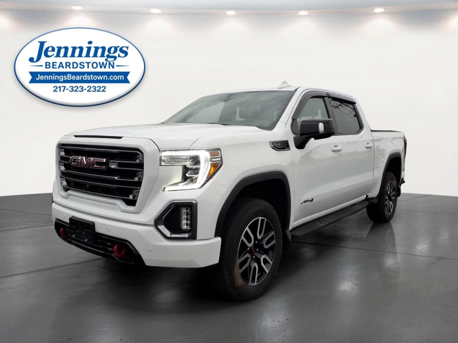 2021 GMC Sierra 1500 AT4 in Summit White — front three-quarter view