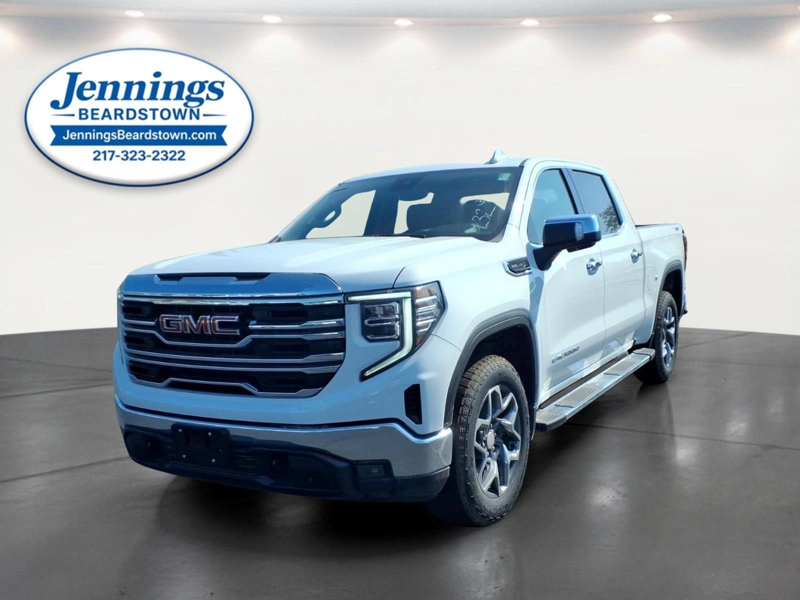2026 GMC Sierra 1500 SLT in Summit White — front three-quarter view